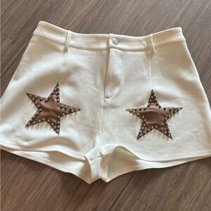 Stylish White Shorts with Brown Star Accents